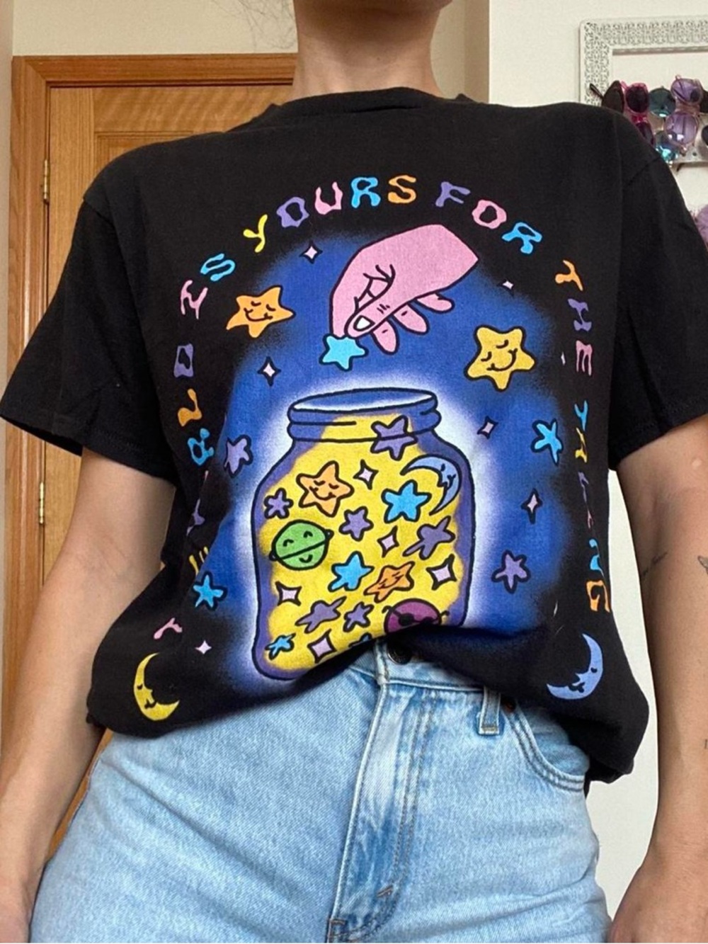 Black Graphic Tee with Colorful Whimsical Star Jar Design